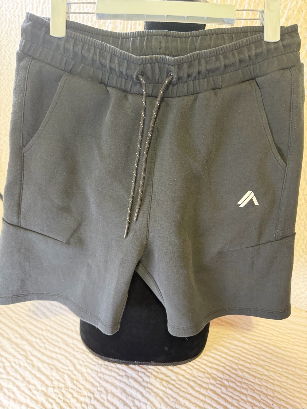 Alphalete Black Drawstring Shorts with Subtle Tag Detail